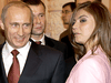Russian President Vladimir Putin with Russian gymnast Alina Kabaeva during a meeting with the Russian Olympic team at the Kremlin in 2004.