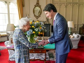 Queen Elizabeth, left, receives Prime Minister Justin Trudeau at Windsor Castle, in Windsor, U.K., on March 7.