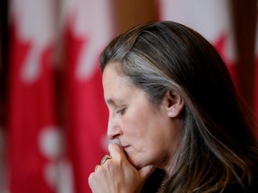 Deputy Prime Minister and Minister of Finance Chrystia Freeland participates in a media availability to discuss Canadian sanctions on Russia, as Russia continues to invade Ukraine, in Ottawa, on Tuesday, March 1, 2022. THE CANADIAN PRESS/Justin Tang