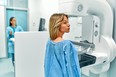 In the hospital, the patient undergoes a screening procedure for a mammogram, which is performed by a mammogram. A modern technologically advanced clinic with professional doctors.