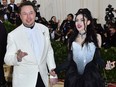 Elon Musk and Grimes arrive for the Met Gala on May 7, 2018, at the Metropolitan Museum of Art in New York.
