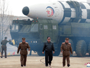North Korean leader Kim Jong Un walks away from what state media report is a 