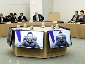NATO leaders hold a video call with Ukrainian President Volodymyr Zelenskyy during a NATO summit on Russia's invasion of Ukraine, at the alliance's headquarters in Brussels, on March 24, 2022.