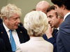 Britain’s Prime Minister Boris Johnson, left, speaks with France’s President Emmanuel Macron, Canada’s Prime Minister Justin Trudeau and European Commission President Ursula von der Leyen during a NATO summit at the alliance’s headquarters in Brussels on March 24, 2022.