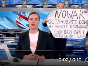 A woman, later identified as Marina Ovsyannikova, interrupted a live newscast on Russian state TV to protest the invasion of Ukraine.