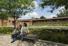 Visitors sit outside the Darwin Martin House Complex, designed by Frank Lloyd Wright.