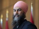 New Democratic Party leader Jagmeet Singh smiles 
during a news conference, Tuesday, March 22, 2022 in Ottawa.  THE CANADIAN PRESS/Adrian Wyld 