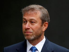 Russian billionaire and owner of Chelsea football club Roman Abramovich arrives at a division of the High Court in central London, in Oct. 2011.