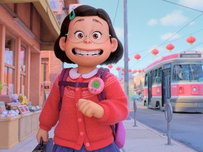 Tamagotchi in tow: Mei (voiced by Rosalie Chiang) in a scene from Turning Red.