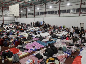 Indian students that fled Ukraine rest in a sports hall in Voluntari, Ilfov, near Bucharest, Romania, on Feb. 28.