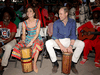 Prince William and Catherine, the Duke and Duchess of Cambridge, play drums during a visit to Trench Town Culture Yard Museum where Bob Marley used to live, during a royal tour of the Caribbean, March 22, 2022 in Kingston, Jamaica.