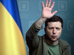Ukrainian President Volodymyr Zelenskyy calls on the West to increase military aid to Ukraine, during a press conference on March 3, 2022, in Kyiv.