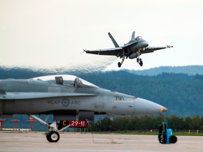A Canadian Forces CF-18 Hornet comes in for a landing at CFB Bagotville, Quebec, on June 7, 2018.
