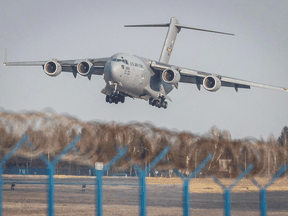 A C-17 Globemaster cargo plane lands at Rzeszow-Jasionka Airport in Poland, on February 16, 2022.