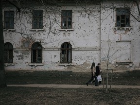 A building scarred by artillery fire in Bender, Transnistria, is among the remaining traces of a war in the early 1990s.