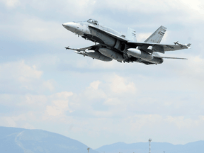 A Canadian Forces CF-18 takes off to help enforce a no-fly zone over Libya in 2011.