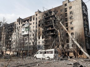 A view shows an apartment building destroyed in the course of Ukraine-Russia conflict in the besieged southern port city of Mariupol, Ukraine, March 25.