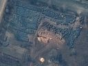 Maxar enthüllte Satellitenbilder eines Massengrabes in der Stadt Bucha, Ukraine, wo am 10. März auf dem Gelände der St.-Andreas-und-Pyervozvannoho-Kirche die ersten Ausgrabungsspuren zu sehen waren.