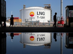 A liquified natural gas storage tank is reflected at PetroChina's receiving terminal at Rudong port in Nantong, Jiangsu province, China, September 4, 2018.
