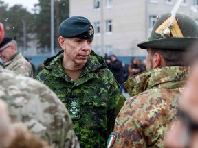 Gen. Wayne Eyre, chief of the defence staff, talks with soldiers during a visit of the Adazi military base, north east of Riga, Latvia, on March 8.