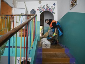Marie cleans up at a Hostomel Kindergarten. Adam Zivo/National Post