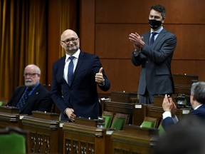 In this 2020 photo, Minister of Justice David Lametti gives a thumbs up as he rises to vote in favour of a motion on Bill C-7, the act that in 2023 will make Canada one of the few countries on earth with legalized euthanasia for patients whose only underlying condition is a non-terminal psychiatric disorder.
