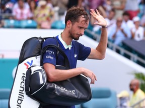 MIAMI GARDENS, FLORIDA - MARCH 31: Daniil Medvedev of Russia waves to the crowd as he leaves the court after losing to Hubert Hurkacz of Poland in their Men's quarterfinal match during the Miami Open at Hard Rock Stadium on March 31, 2022 in Miami Gardens, Florida.
