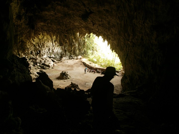  Archaeologist Douglas Hobbs surveys the cave at Liang Bua where the remains were discovered.