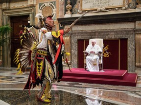A delegation member chants and dances before Pope Francis during an audience to Canada’s Indigenous delegations at the Vatican on April 1, 2022.