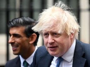 UK Prime Minister Boris Johnson and finance minister Rishi Sunak will face fines for breaching Covid-19 lockdown laws stemming from the "partygate" scandal, a Downing Street spokeswoman said on April 12, 2022.