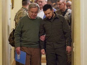 UN Secretary-General Antonio Guterres, left, and Ukrainian President Volodymyr Zelensky leave a news conference after their meeting in Kyiv, Ukraine, Thursday, April 28, 2022.