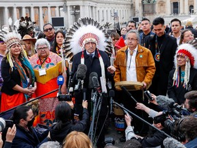Newly elected Dene National Chief Gerald Antoine and Phil Fontaine, indigenous leader who revealed Canada's resident schools abuse, speak to the media near St. Peter's Square, after delegates from Canada's indigenous peoples attended a meeting with Pope Francis at the Vatican, March 31, 2022. REUTERS/Remo Casilli