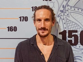This handout photo taken on April 25, 2022 and released on April 26 by the Bali Immigration Office shows Canadian tourist Jeffrey Craigen detained by immigration authorities in Denpasar, on Indonesia's resort island of Bali.