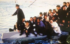 A screenshot from a deleted scene in the 1997 film Titanic showing how survivors took refuge aboard Collapsible B. Joughin, played by Liam Tuohy, is shown in white. Tuohy posted this image to his official Twitter account.