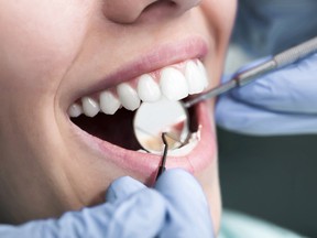 The NDP-Liberal plan for national dental care may run into a jurisdictional battle with the provinces