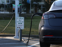 An electric vehicle recharges its battery. (Photo by Justin Sullivan/Getty Images)