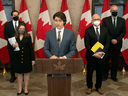 Public Safety Minister Marco Mendicino, Deputy Prime Minister Chrystia Freeland, Justice Minister David Lametti and Emergency Preparedness Minister Bill Blair support Prime Minister Justin Trudeau as he announces that the Measures Act will be invoked to deal with protests in Ottawa on February 14, 2022.