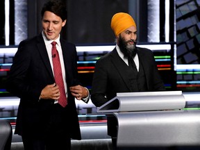 Liberal Leader Justin Trudeau and NDP Leader Jagmeet Singh take part in a federal election debate in Gatineau, Canada, September 9, 2021. Justin Tang/Pool via REUTERS/File Photo