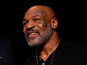 Mike Tyson punched a man on a U.S. Jet Blue flight.