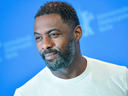 British actor, director and executive producer Idris Elba poses during a photo call for the film