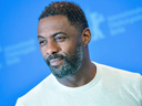 British actor, director and executive producer Idris Elba poses during a photo call for the film 