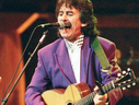 FILE: Picture dated Oct. 17, 1992 in New York showing George Harrison performing 
