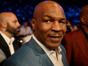 FILE: Former boxer Mike Tyson attends the super welterweight boxing match between Floyd Mayweather Jr. and Conor McGregor on Aug. 26, 2017 at T-Mobile Arena in Las Vegas, Nev. / PHOTO BY CHRISTIAN PETERSEN/GETTY IMAGES