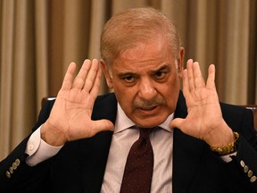 Shehbaz Sharif, elected as Pakistan's new prime minister on Monday, gestures during a news conference in Islamabad on April 1, 2022.