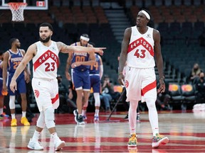 Toronto Raptors forward Pascal Siakam (43) and guard Fred VanVleet (23) react to a call during the fourth quarter against the Phoenix Suns at Scotiabank Arena.