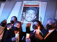 People take part in a vigil ahead of the planned execution of Malaysian drug trafficker Nagaenthran Dharmalingam, outside Singapore High Commission in Kuala Lumpur, Malaysia, April 26, 2022.