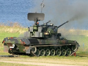 This handout photo taken at the military base camp in Todendorf, northern Germany on October 7, 2004 and provided by the German armed forces Bundeswehr on April 26, 2022 shows a Gepard anti-aircraft gun tank (FlakPz) shooting at air targets during a practice.