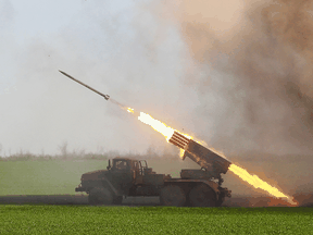 Ukrainian soldiers fire a rocket in Luhansk Region on Tuesday, April 26, 2022. More heavy weaponry is on its way to Ukraine.