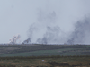Smoke rises after shelling by Russian troops in Luhansk Region, Ukraine April 26, 2022.