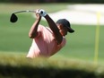 Tiger Woods warms up in the practice area prior to the Masters at Augusta National Golf Club on April 03, 2022 in Augusta, Georgia. (Photo by Gregory Shamus/Getty Images)